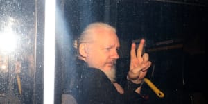 Assange in a police vehicle following his arrest at London’s Ecuadorian embassy in April. 