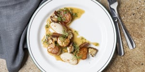 Scallops with cauliflower,pancetta,and a champagne vinaigrette.