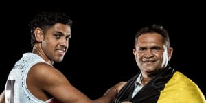 Young Saint Nasiah Wanganeen-Milera (left) with St Kilda great Nicky Winmar.