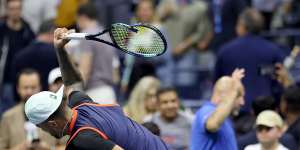 Nick Kyrgios smashes his racquet during his match against Karen Khachanov.