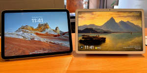 The 10th Gen iPad,left,next to the Pixel Tablet in its dock.