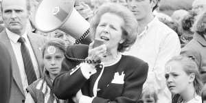 Prime Minister Margaret Thatcher with her handbag.