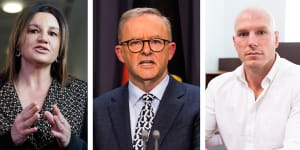 Anthony Albanese,centre,has the support of Jacqui Lambie and David Pocock for legislating a 2030 emissions reduction target.