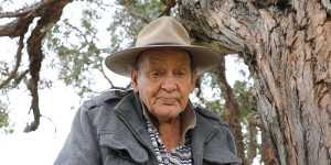 Indigenous Elder Uncle Wes Marne in Whalan Reserve with the Appo Tree,whose leaves are used for smoking ceremonies.