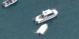 One dead after boat with seven people on board capsizes near Wollongong