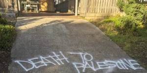‘It won’t silence us’:Islamophobic graffiti sprayed in woman’s driveway referred to police