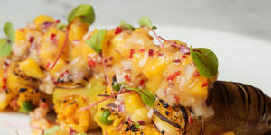 Squid stuffed with spiced chorizo paella and topped with mango salsa.