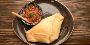 Empanada De Pino filled with beef mince,onion,olives and boiled egg.