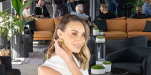Model and Formula 1 enthusiast Brooke Meredith is focused on style restraint in the Mercedes AMG lounge at Albert Park.