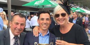 Dean Holland,centre,celebrates winning the 2019 Adelaide Cup on Surprise Baby with father Darren and mother Belinda.