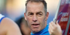Alastair Clarkson has returned to Arden St after a mental-health break,but won’t be back in the coaches’ box on game day just yet.