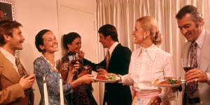 A stock image of a dinner party from the 1970s,a time when the humble potato bake was respected.