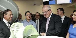 Prime Minister Scott Morrison and Health Minister Greg Hunt visit the Icon Cancer Centre in Canberra in April.