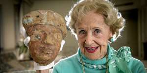 Real ilfe tomb raider Joan Howard pictured with a mummy mask she found at Sakkara,the necropolis for the ancient Egyptian capital Memphis.