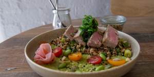 Seared tuna bowl with quinoa,brown rice,avocado,edamame,pickled ginger and seaweed.