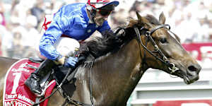 Makybe Diva and Glen Boss win the third of their Melbourne Cups at Flemington.