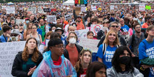 Demonstrators listen to speakers during a March For Our Lives rally near the Washington Monument.