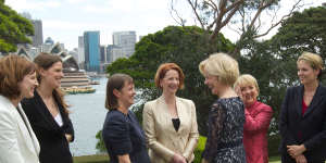A different world:Governor-General Quentin Bryce speaks to female ministers in Julia Gillard’s government,including Kate Ellis (second from left),after their swearing-in at Admiralty House in 2011.
