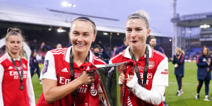 Caitlin Foord (left) and Steph Catley after their League Cup triumph with Arsenal in March.