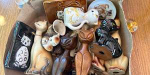 I found a box filled with statues of cats in my attic. No one knows how they got there but I’ve managed to find them a new home.