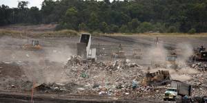 Queensland waste trucks dump unprocessed construction waste from NSW at Cleanaway's New Chum landfill in Ipswich.
