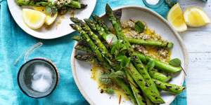 Barbecued asparagus with nutty tarator.