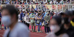 People line up to get vaccinated at the Gelora Bung Karno Main Stadium in Jakarta,Indonesia.