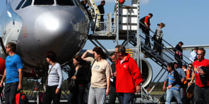 Flight Centre narrows losses as consumers travel despite downturn