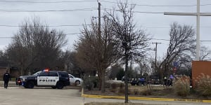 Police secure the area around Congregation Beth Israel synagogue in Colleyville,Texas.