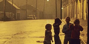 Point of departure ... local children play in the street in Cobh.