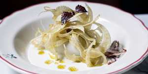 A study in pale tones:Calamari stuffed with breadcrumbs,served in a cream sauce and draped with fennel slices.
