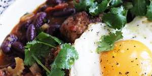 Try a lacy fried egg on an easy dinner of red beans and chorizo meatballs.
