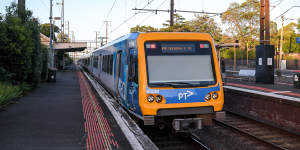 A train arrives at Mont Albert train station in 2022.