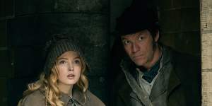 Ellie Bamber as Cosette and Dominic West as Jean Valjean.