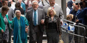 Rolf Harris leaves court after being found guilty of 12 indecent assault charges.