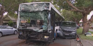 Dozens of people injured after two buses,car collide in Sydney
