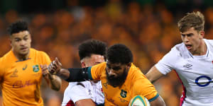 Marika Koroibete is tackled during the third Test against England at the SCG.