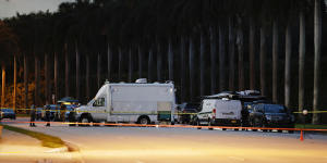 Police crime scene vehicles at Trump International Golf Club after police closed off the area following the apparent assassination attempt.