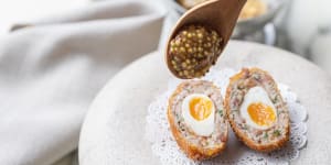 A'spent salami scotch egg'with charcuterie offcuts and soft-yolked quail egg.