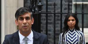 Rishi Sunak,pictured in Downing Street with his wife,Akshata Murty,on Friday morning (UK time),resigns as Tory leader.