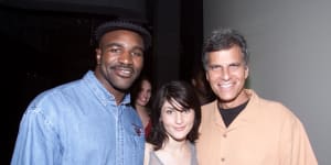 Evander Holyfield at the Last Lap,with singer Leah Haywood and American swimming legend Mark Spitz.