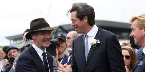 Gillon McLachlan congratulates trainer Ciaron Maher after Bella Nipotina;s win in The Everest.