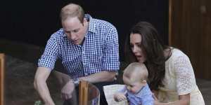 Prince William and Catherine introduce Prince George to a Bilby named after him at Taronga Zoo during the 2014 tour. 