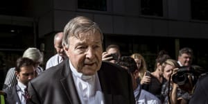 Cardinal George Pell leaves the County Court on December 11,2018,after being found guilty of sexually assaulting two choirboys in 1996 in Melbourne. 