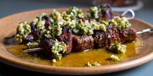 Paprika lamb skewer with a salsa verde of green olives,parsley and garlic.