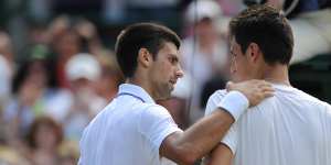 Novak Djokovic consoles Bernard Tomic after a four set victory against the then 18-year-old in the quarter finals at Wimbledon in 2011.