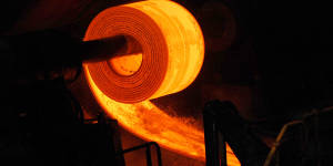 Hot roll coils are formed during the manufacturing of steel at BlueScope Steel’s Port Kembla Steelworks.