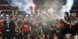 Champions:The Crusaders celebrate their Super Rugby final win against the Lions at Ellis Park.
