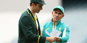 Pat Cummins and Justin Langer before the toss on Boxing Day.