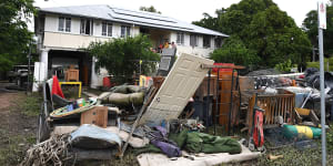 Six Townsville buildings looted after residents fled rising waters